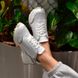 Шкіряні білі жіночі кросівки Emeli 1155.017 1421162246 фото 1 - каталог жіночого взуття