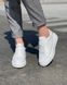 Білі шкіряні жіночі кеди Emeli 106-110 456564533221 фото 1 - каталог жіночого взуття